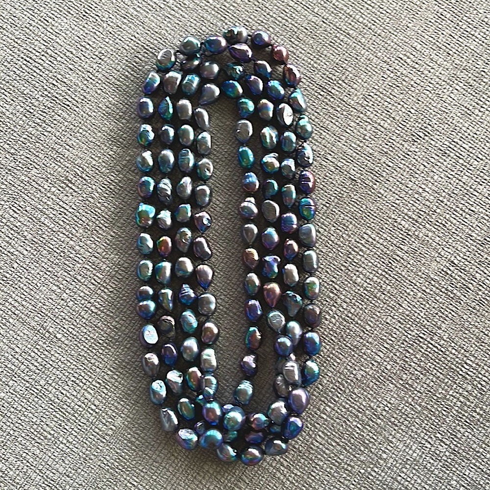 Handmade extra long in length beaded necklace. Iridescent bead color